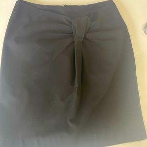 Black pencil skirt with the knot detail on the front knee length size M